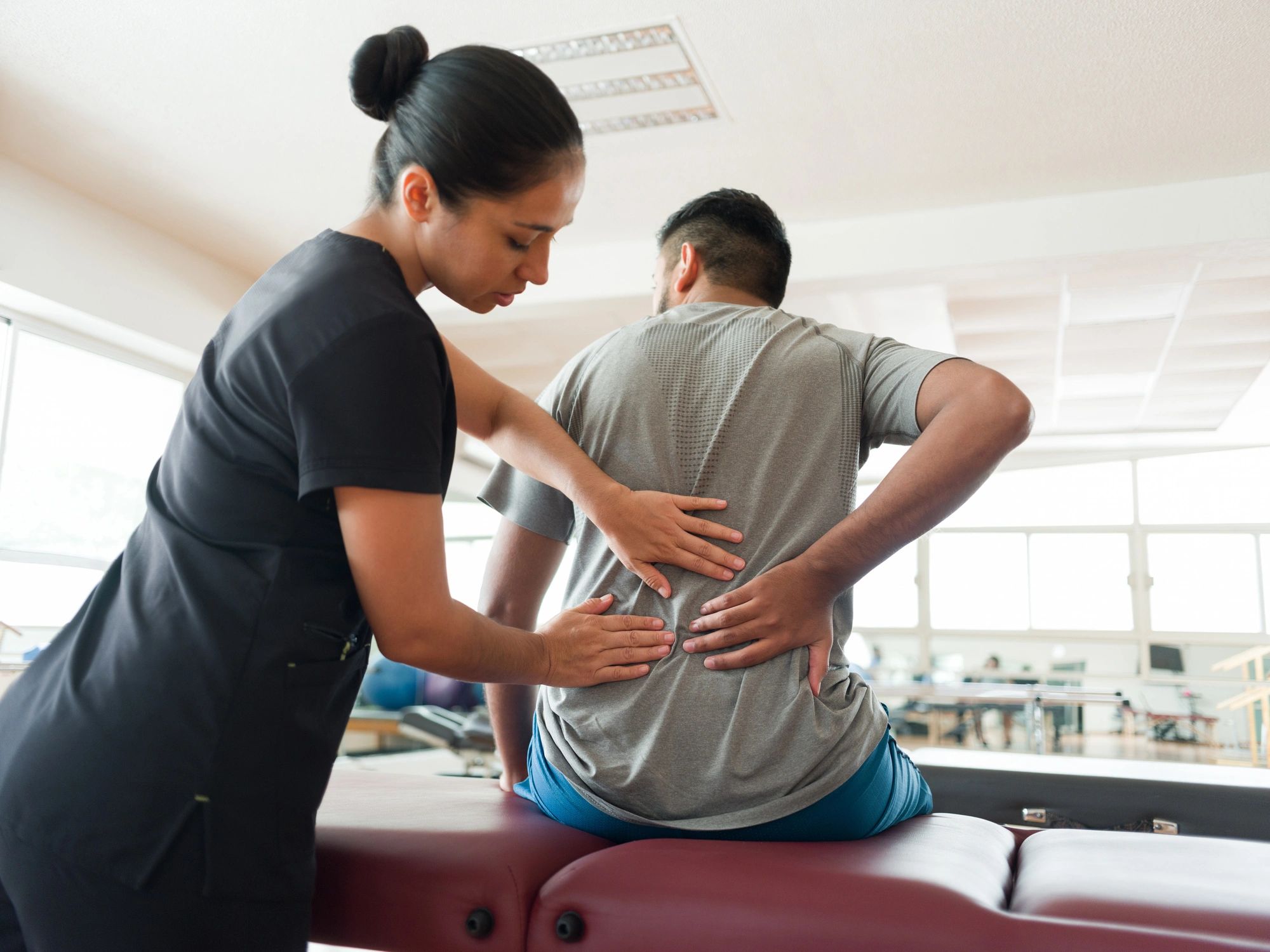Therapeutic treatment session in a chiropractic care setting