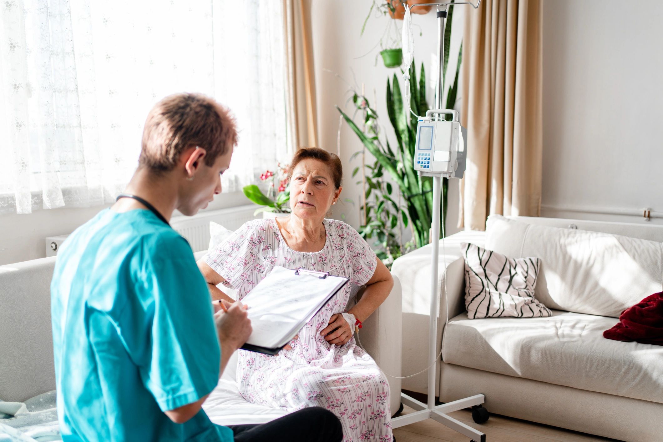 Healthcare professional consulting with a patient in a supportive setting