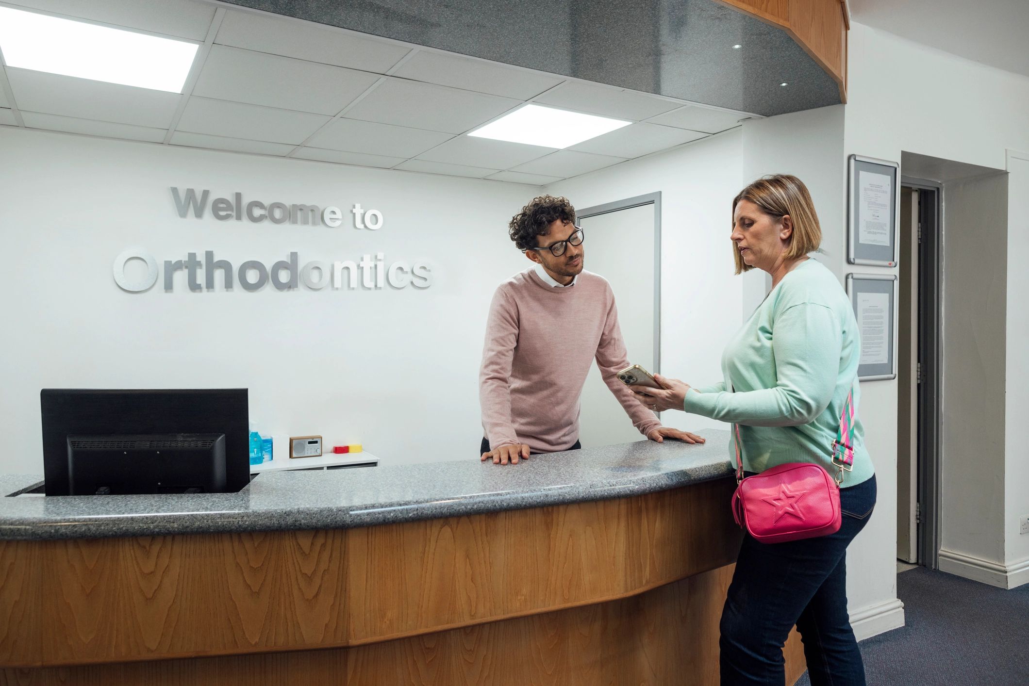 Patient checking in at a dental practice