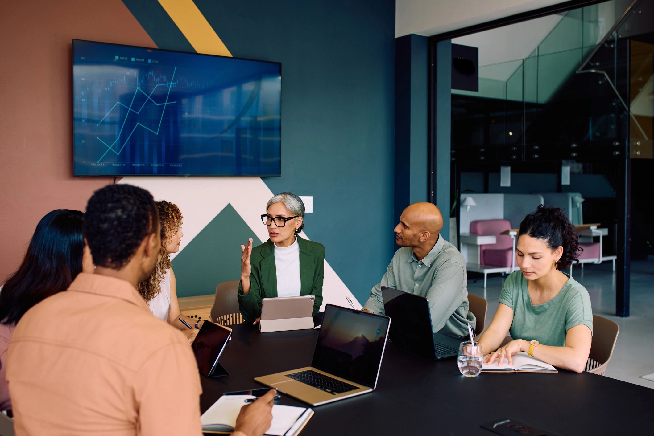 Professional team meeting in a conference room planning healthcare marketing strategy